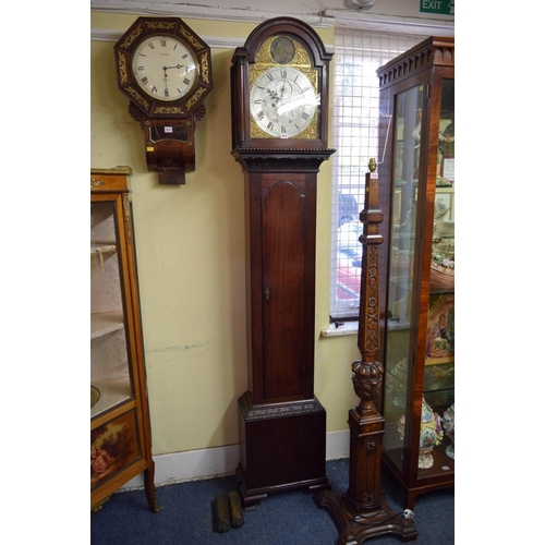 1915 - A George III mahogany eight day longcase clock, the 11½in dial with rocking ship to the arch, inscri... 