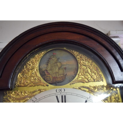 1915 - A George III mahogany eight day longcase clock, the 11½in dial with rocking ship to the arch, inscri... 