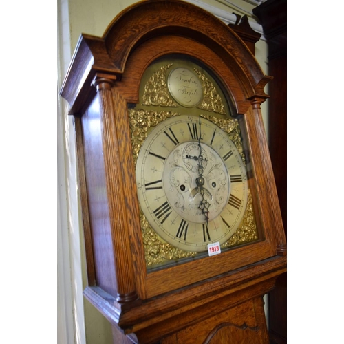 1918 - An oak 8 day longcase clock, the 12in arched dial inscribed 'Ts Farmer, Stockton', 205cm high, with ... 