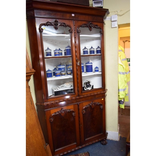 1924 - A Victorian carved mahogany standing corner cupboard, 226cm high x 131cm wide.