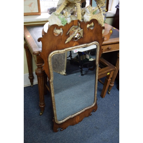 1941 - A Georgian style yew wood and silvered fret framed wall mirror, 93.5 x 53cm.