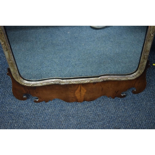 1941 - A Georgian style yew wood and silvered fret framed wall mirror, 93.5 x 53cm.