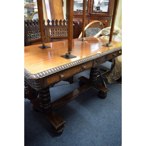 1950 - A William IV rosewood library table, with a pair of frieze drawers, 123cm wide.