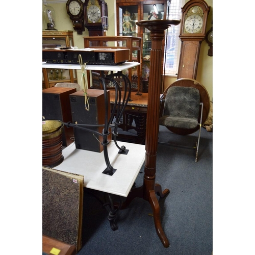 1952 - A pair of mahogany bedpost torcheres.