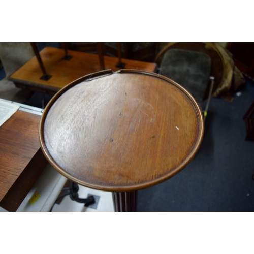 1952 - A pair of mahogany bedpost torcheres.