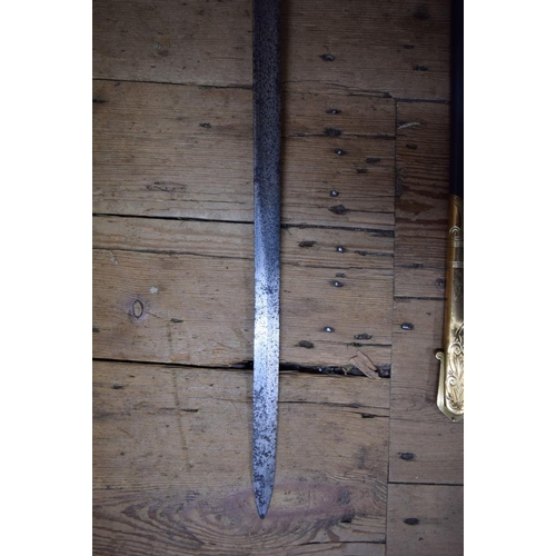 1975 - A Victorian naval officer's dress sword and scabbard, the scabbard bearing plaque 'Whiteman, Outfitt... 