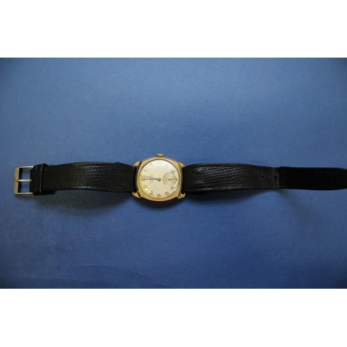 A 1950s Cortebert Spirofix 9ct gold gentleman s watch on leather