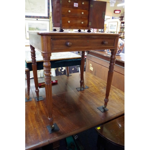 1835 - A Regency mahogany writing table, indistinctly stamped 'Gillows, Lancaster', 'the rounded corner top... 