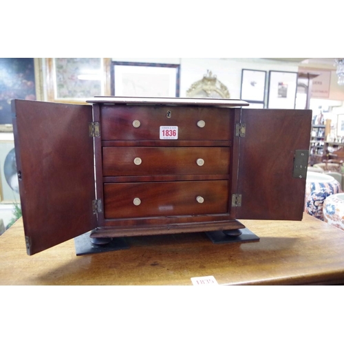 1836 - A 19th century mahogany miniature cabinet, 26.5cm wide.