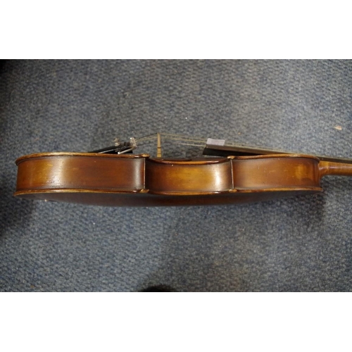 1852 - An antique Continental violin, with 14 in back, with ebonized wood case and bow.