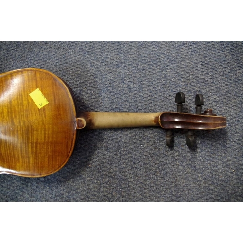 1853 - An antique Continental violin, labelled 'Antonius Stradivarius', cased.