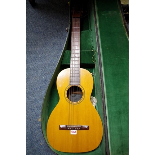 1857 - An old six string small acoustic guitar, by Bay State, in ebonized case.