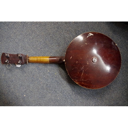 1858 - An F D H Ltd four string banjolele, cased.