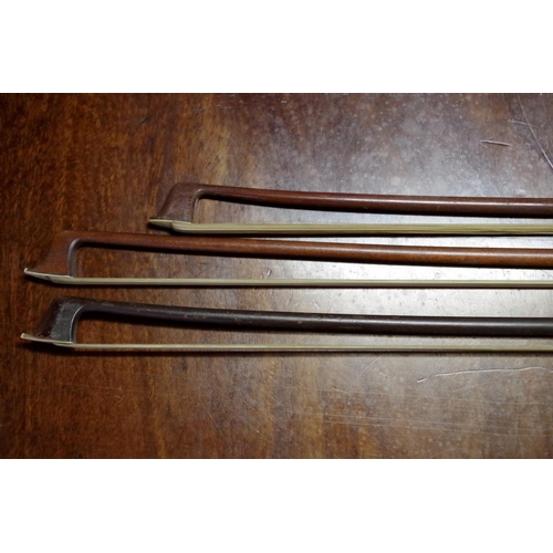 1860 - Three antique violin bows, each indistinctly inscribed with name.