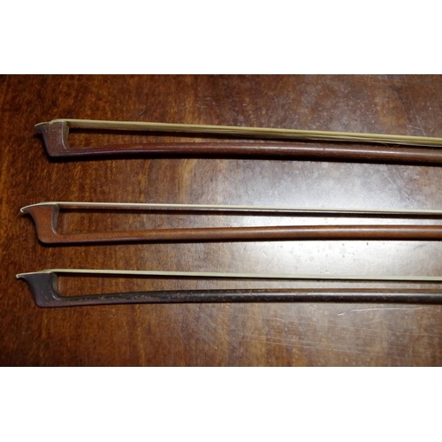 1860 - Three antique violin bows, each indistinctly inscribed with name.