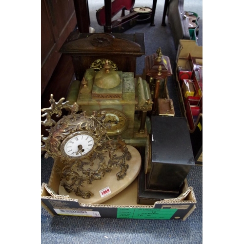 1869 - Six various clocks and timepieces, to include a green onyx and brass example.