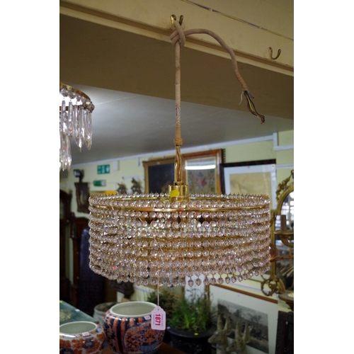 1871 - A vintage Lobmeyr brass eight bulb five tier chandelier; together with another four tier chandelier.