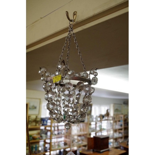 1873 - A two tier chandelier; together with a bag chandelier.