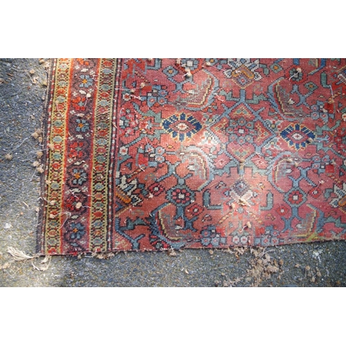 1192 - An Afghan rug, having floral decoration to centre with bird motifs and two central geometric medalli... 