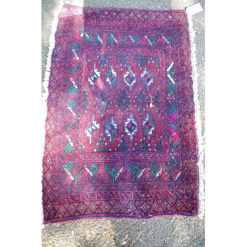 1194 - A Bokhara rug, having floral and geometric design; together with another Bokhara rug having three ce... 