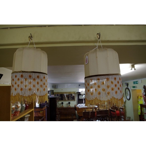 1757 - A pair of Art Deco beaded lampshades, 29cm high.