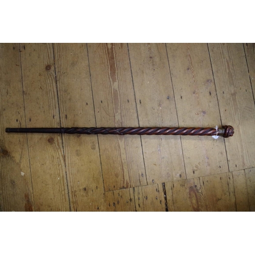 1827 - A spiral reeded mahogany walking cane, with 'Turk's Head' knot terminal.