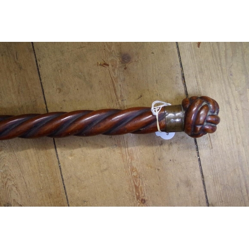 1827 - A spiral reeded mahogany walking cane, with 'Turk's Head' knot terminal.