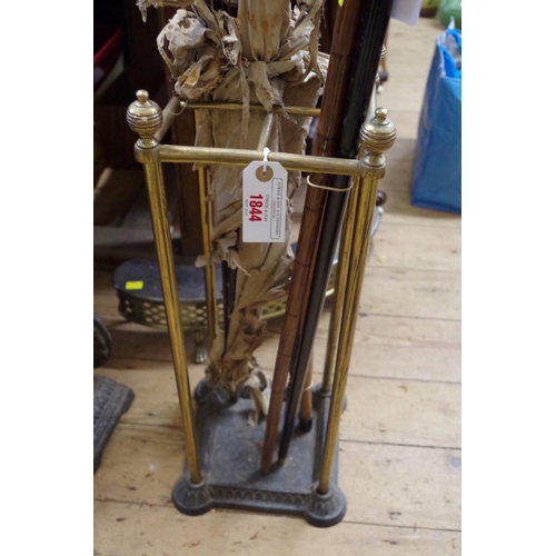 1844 - A Victorian brass and cast iron four division stickstand.