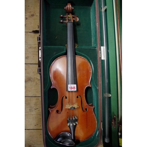 1845 - A late 19th century French violin, with 14in two piece back, with bow and padded case.... 