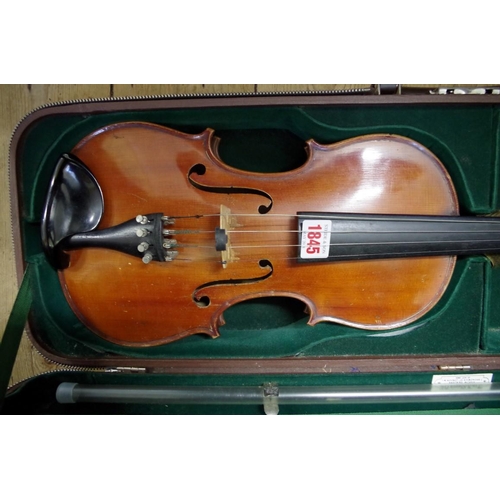 1845 - A late 19th century French violin, with 14in two piece back, with bow and padded case.... 