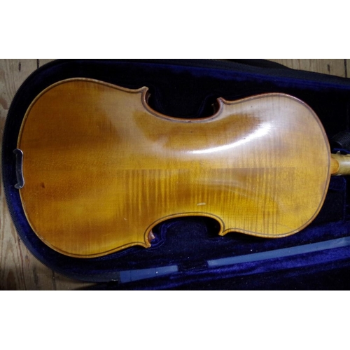 1846 - An antique Continental violin, with two piece 13¼in back, in padded case.