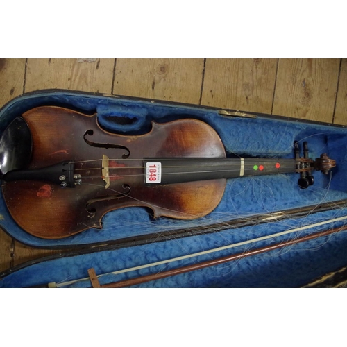 1848 - A late 19th century Continental violin, the two piece 14in back inscribed 'Amati', with bow and ebon... 