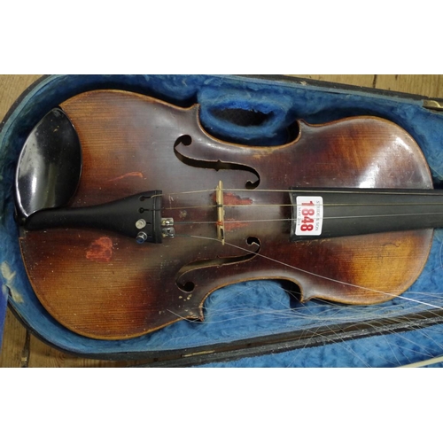 1848 - A late 19th century Continental violin, the two piece 14in back inscribed 'Amati', with bow and ebon... 