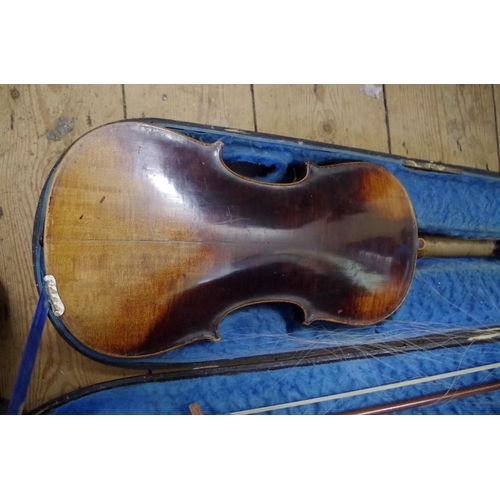 1848 - A late 19th century Continental violin, the two piece 14in back inscribed 'Amati', with bow and ebon... 