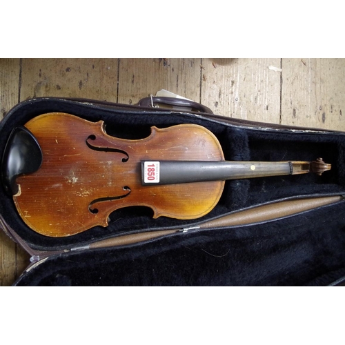 1850 - A late 19th century Continental violin, with two piece 13in back, in case.