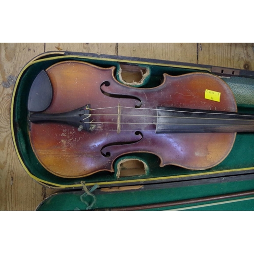 1852 - Two Continental violins, comprising one 13in and one 14in, each with bow and ebonized wood case... 