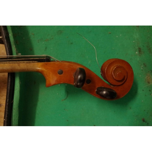 1854 - A violin, with 14in back, with two bows and case. 