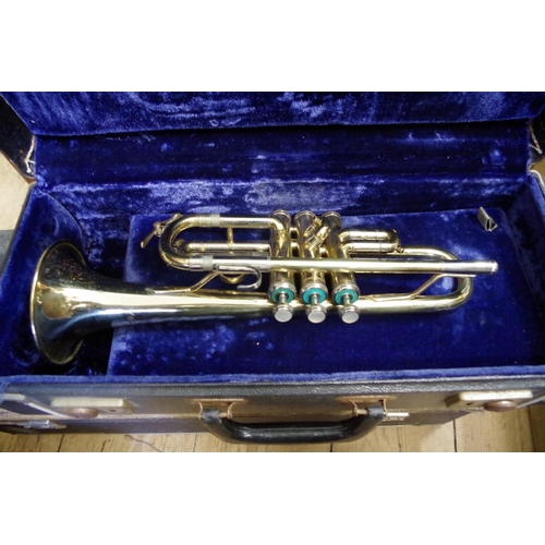 1857 - Two old brass trumpets, by York, each cased.