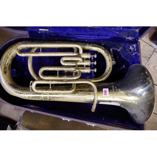 1860 - An old brass baritone horn, by Lark, cased.