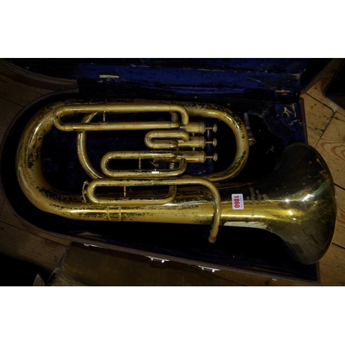 1860 - An old brass baritone horn, by Lark, cased.