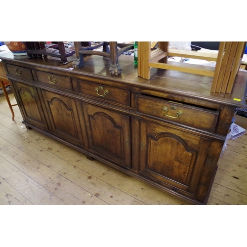 1861 - A good reproduction large oak dresser base, by Brights of Nettlebed, 212cm wide.