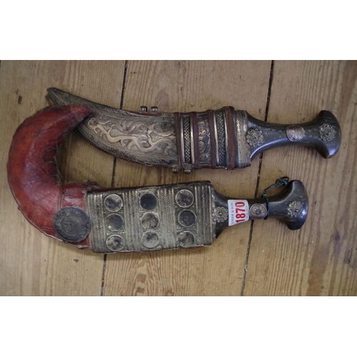 1870 - An eastern horn handled jambiya and metal mounted leather sheath; together with another similar east... 