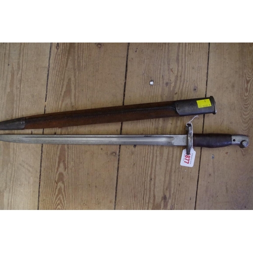 1877 - A British SMLE 1907 pattern Sanderson bayonet, having leather handle and leather sheath.... 