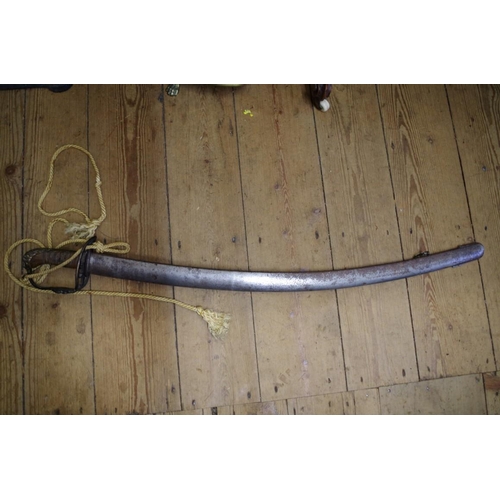 1885 - A 19th century cavalry sword and steel scabbard.