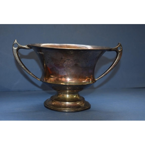 10 - An Edwardian silver twin handled trophy cup, by Lee & Wigfall, Sheffield 1909, 12.5cm, 406g.... 