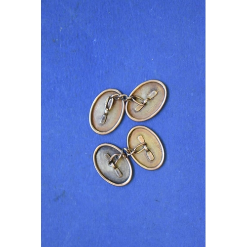 149 - A pair of 9ct gold oval cufflinks, 4g.