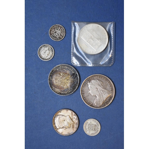 154 - A cased Maria Theresa Thaler; together with a Victoria 1893 crown and other coins