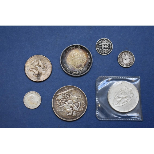 154 - A cased Maria Theresa Thaler; together with a Victoria 1893 crown and other coins