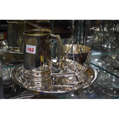 162 - A silver plated circular waiter, by Mappin Brothers; and other silver plated items.... 