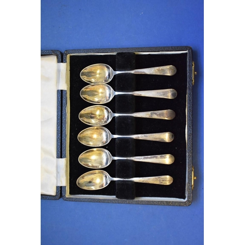 45 - A cased set of six silver coffee spoons, by Cooper Bros, Sheffield 1944, 62g; together with a Rotary... 